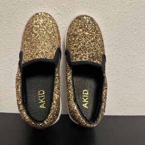 AKID gold shoes